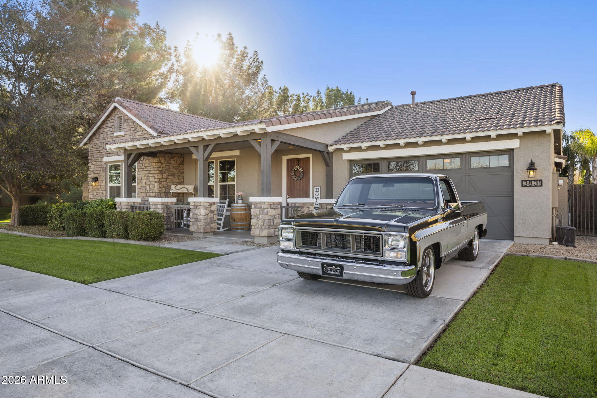 3831 East Weather Vane Road Gilbert, AZ 85296 - Photo 4 of 64 a car parked in front of a house