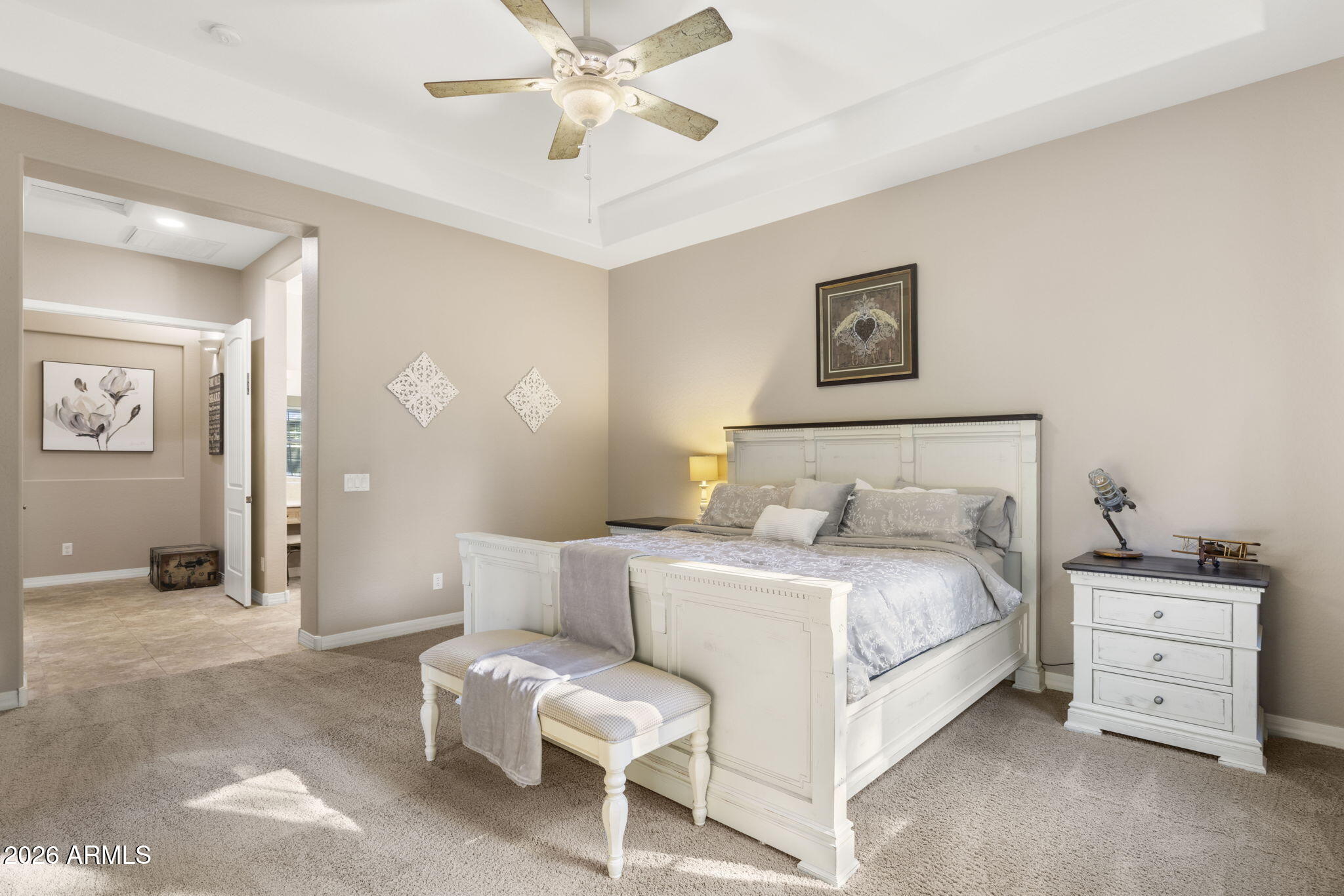 3831 East Weather Vane Road Gilbert, AZ 85296 - Photo 43 of 64 a bedroom with a bed and a chandelier