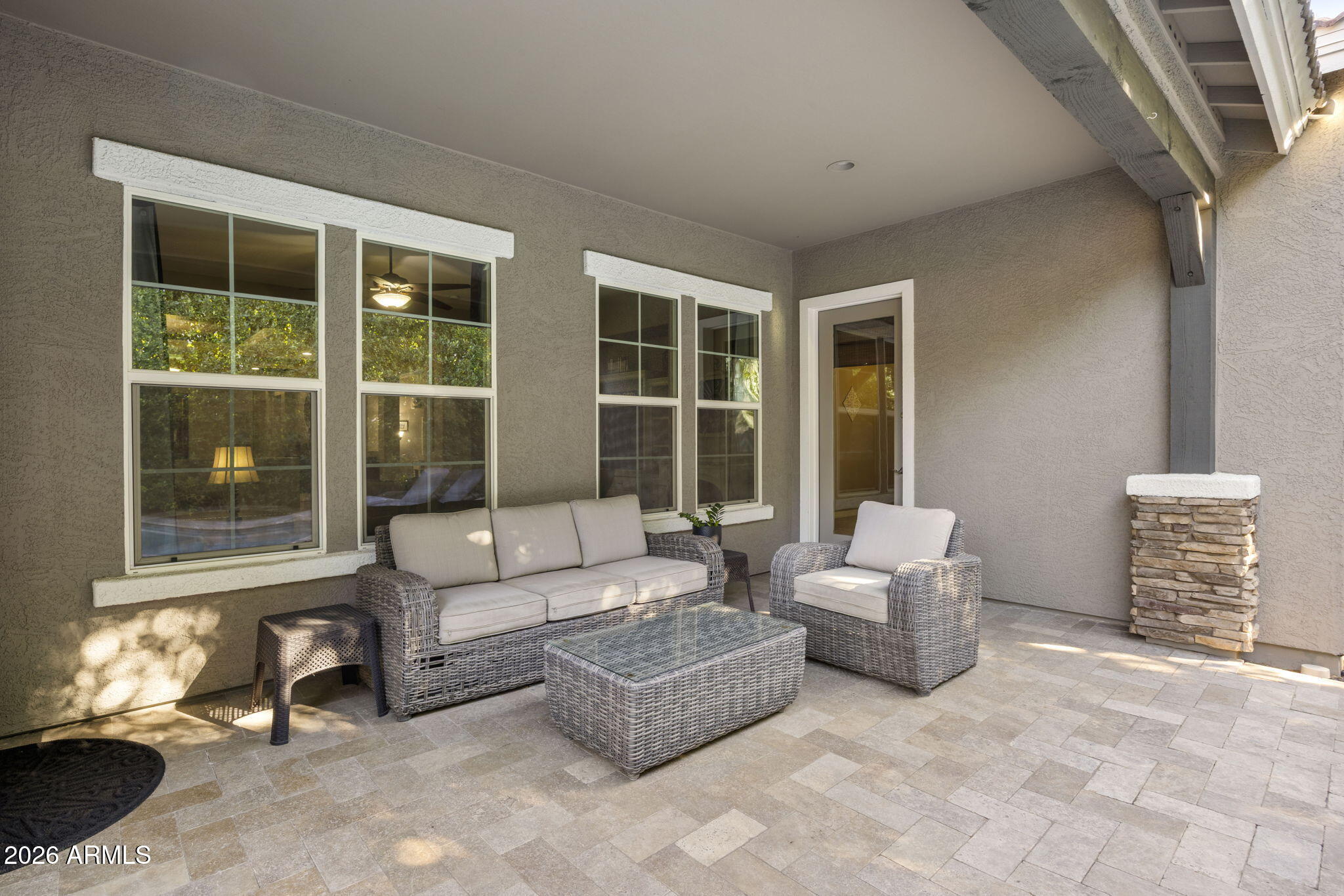 3831 East Weather Vane Road Gilbert, AZ 85296 - Photo 49 of 64 a living room with furniture and a window