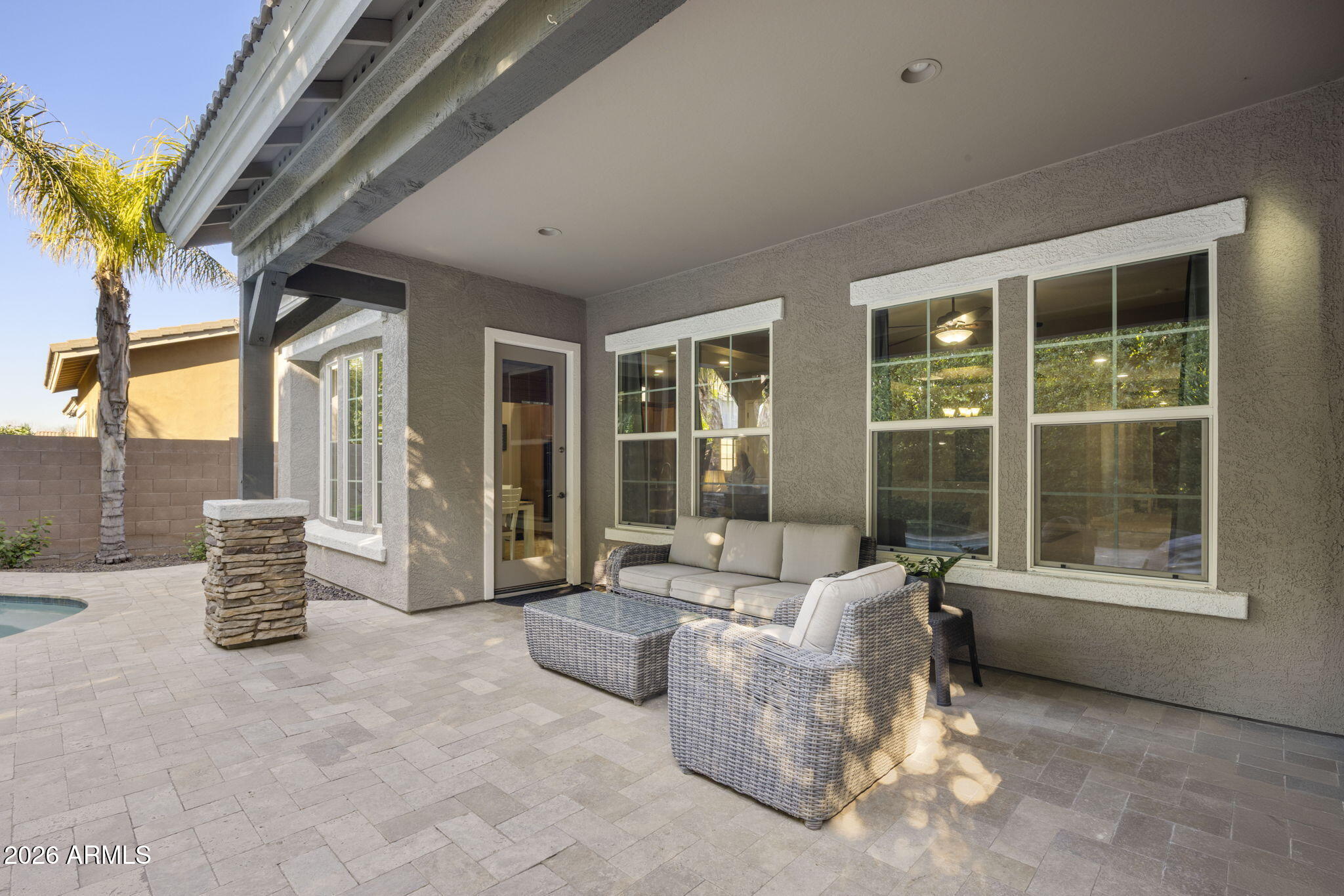 3831 East Weather Vane Road Gilbert, AZ 85296 - Photo 50 of 64 a living room with furniture and a window
