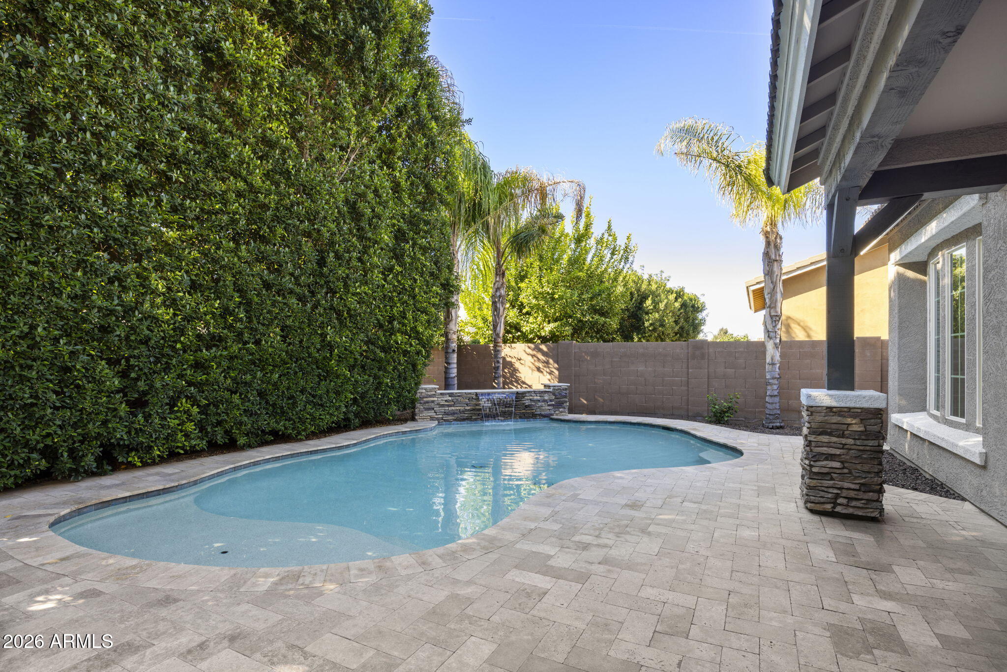 3831 East Weather Vane Road Gilbert, AZ 85296 - Photo 52 of 64 a view of a swimming pool with a patio