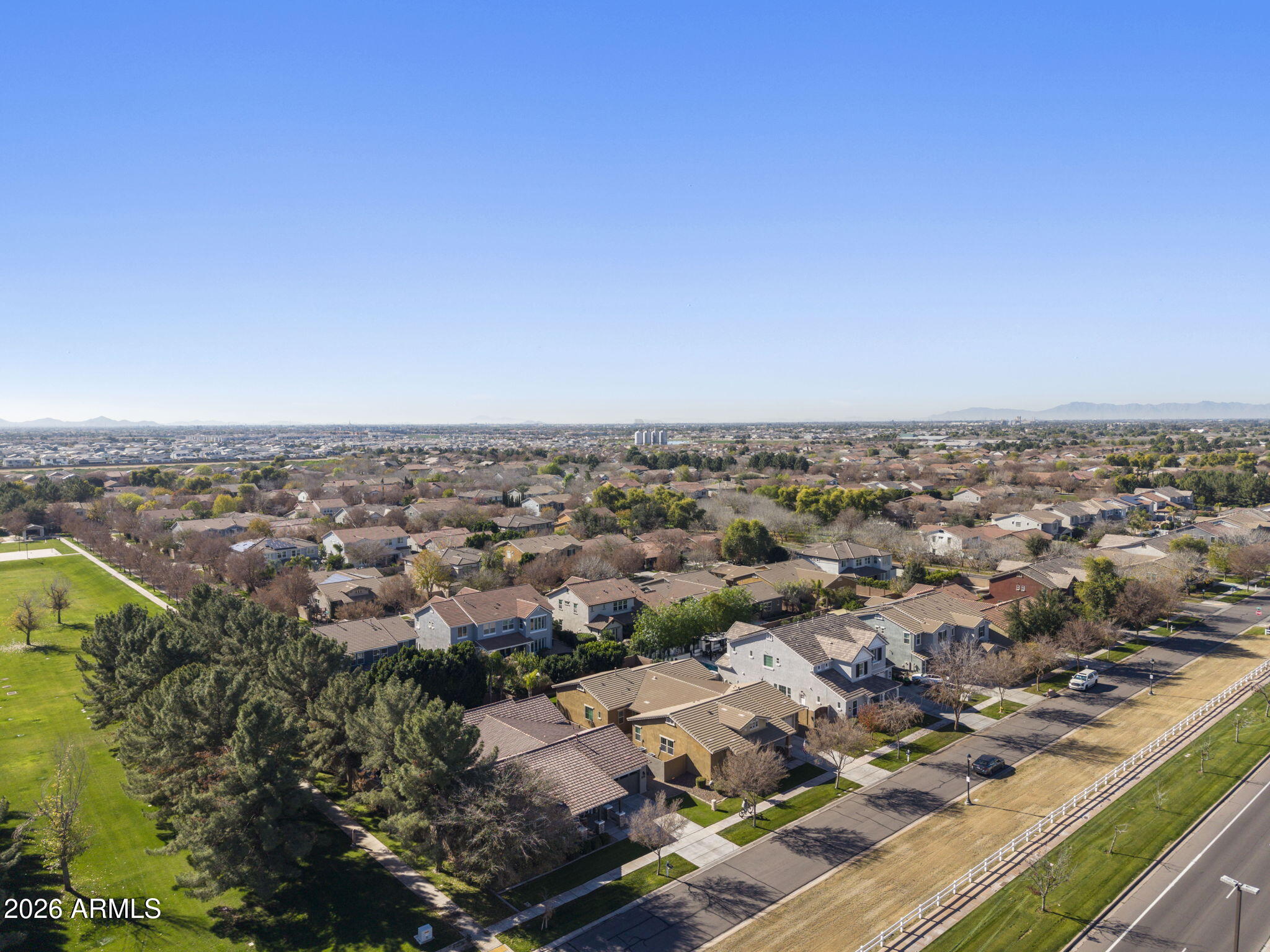 3831 East Weather Vane Road Gilbert, AZ 85296 - Photo 62 of 64 an aerial view of a city with lots of residential buildings