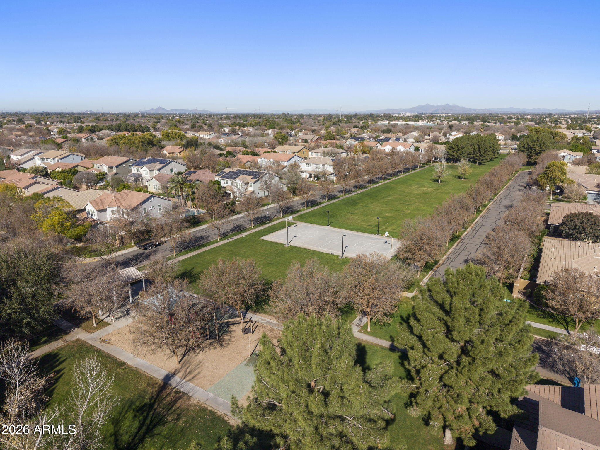 3831 East Weather Vane Road Gilbert, AZ 85296 - Photo 63 of 64 an aerial view of a houses with a yard