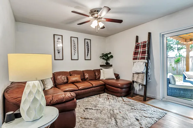 a living room with furniture and window