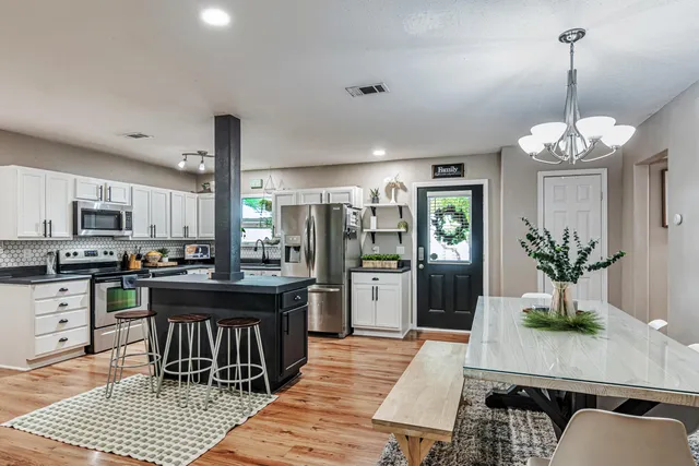 a view of a dining room with furniture