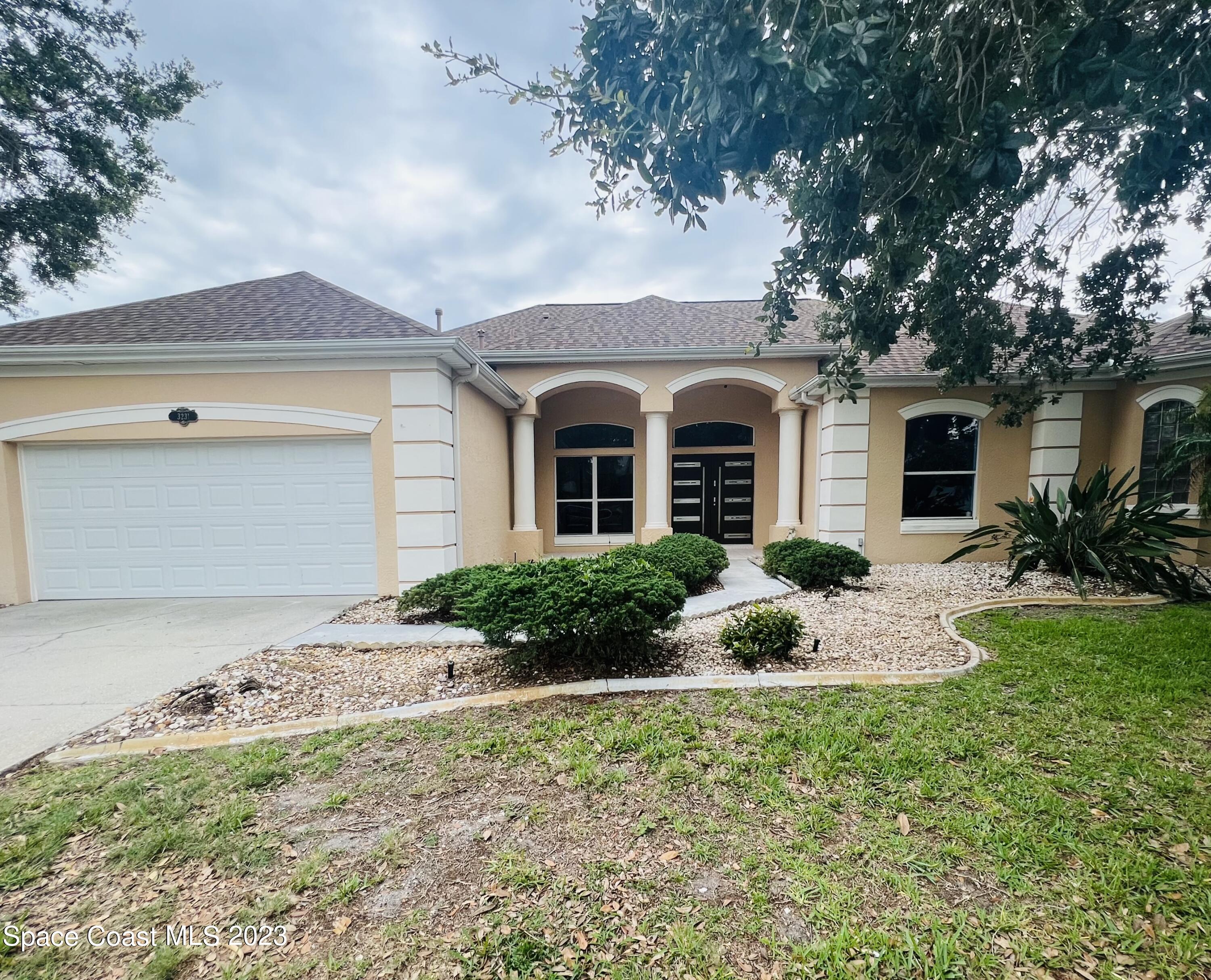 3231 Windsor Estates Drive Melbourne, FL 32940 - Photo 2 of 40 Front of Home-3231 Windsor Estates Dr