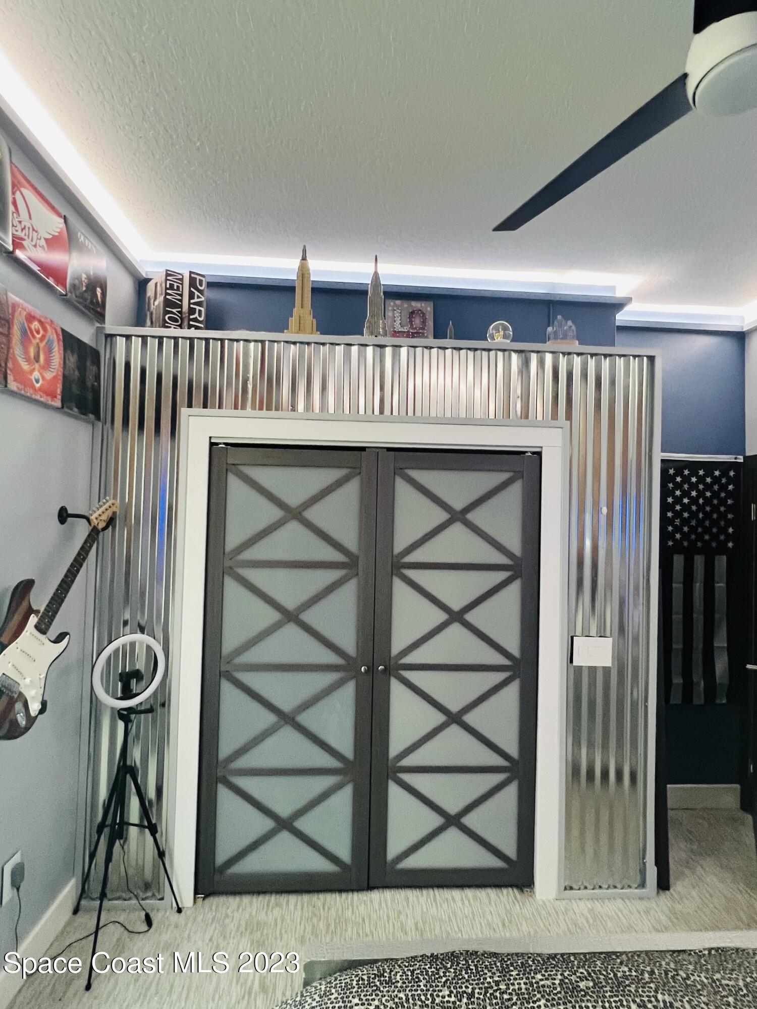 3231 Windsor Estates Drive Melbourne, FL 32940 - Photo 28 of 40 a view of a livingroom with furniture and staircase