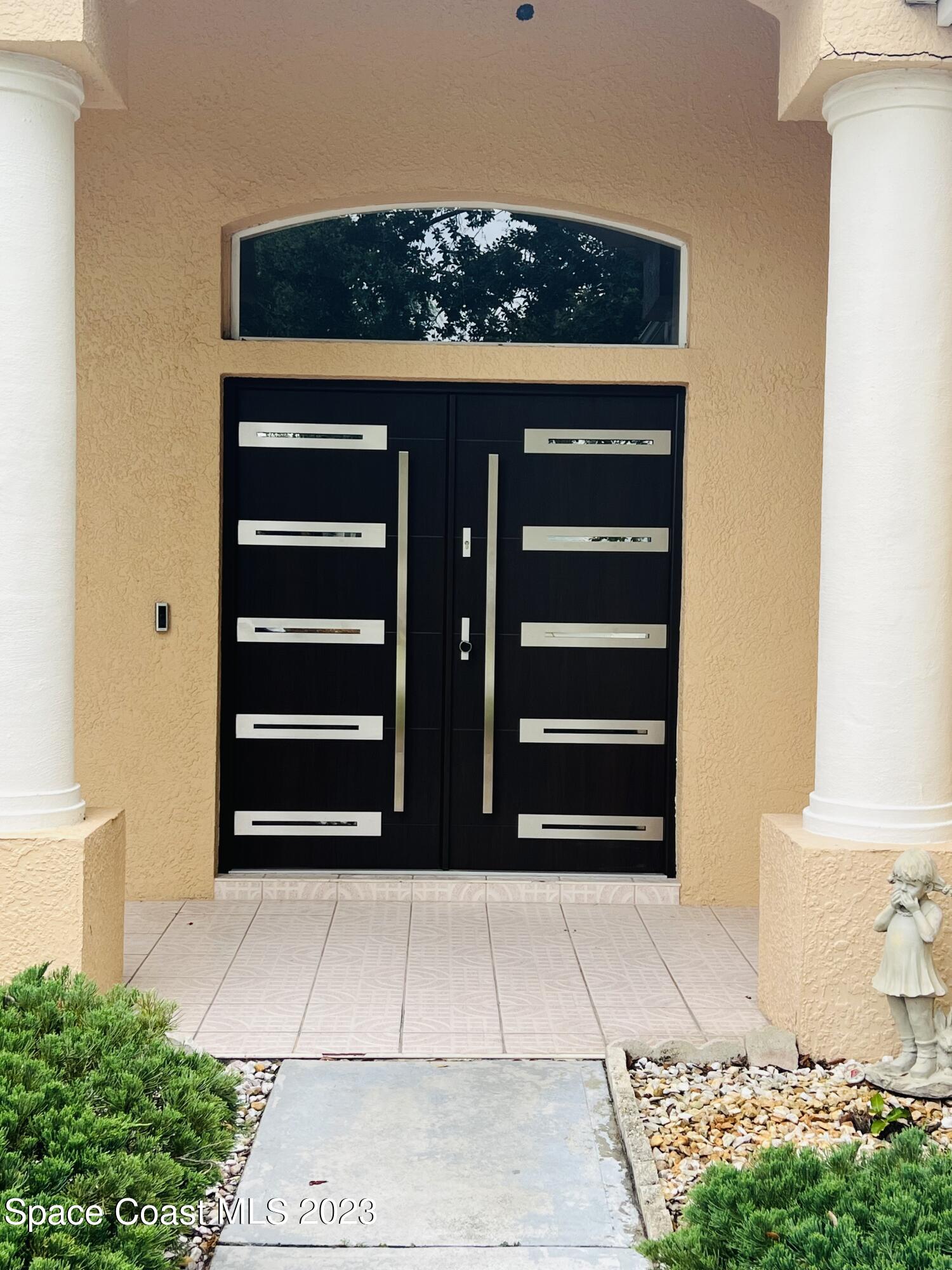 3231 Windsor Estates Drive Melbourne, FL 32940 - Photo 3 of 40 Door-3231 Windsor Estates Dr