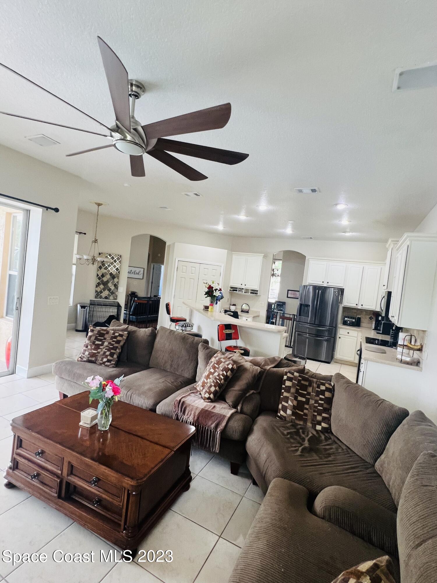 3231 Windsor Estates Drive Melbourne, FL 32940 - Photo 32 of 40 Family room 2-3231 Windsor Estates