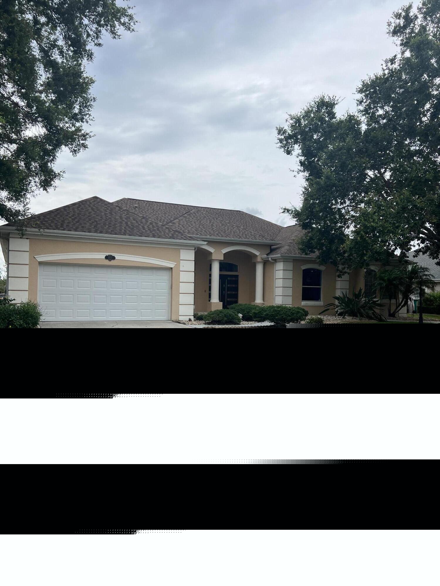 3231 Windsor Estates Drive Melbourne, FL 32940 - Photo 40 of 40 a front view of a house with a yard