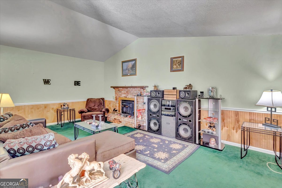 1702 Vada Road Bainbridge, GA 39817 - Photo 15 of 33 a living room with furniture and a table