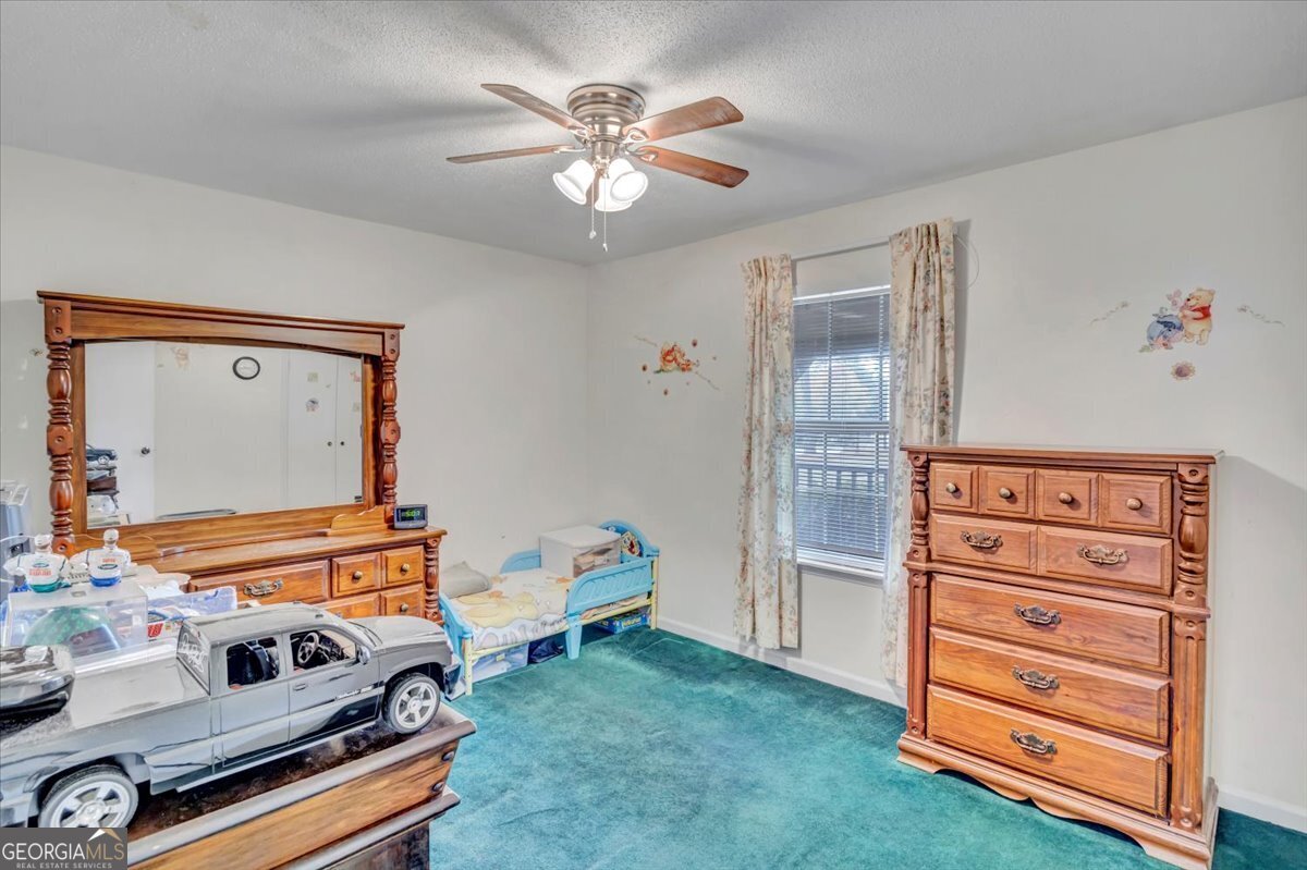 1702 Vada Road Bainbridge, GA 39817 - Photo 9 of 33 a view of a room with workspace