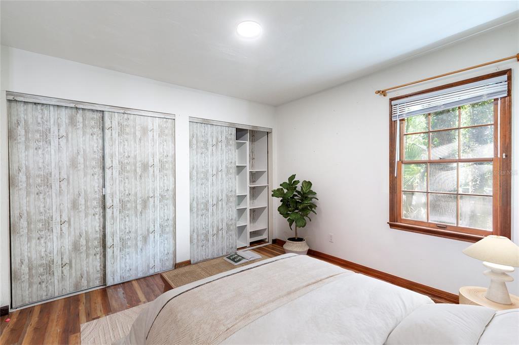 5208 Southwest 86 Terrace Gainesville, FL 32608 - Photo 20 of 26 a bedroom with a bed and a window