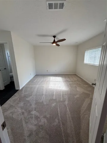 a view of a livingroom with a staircase