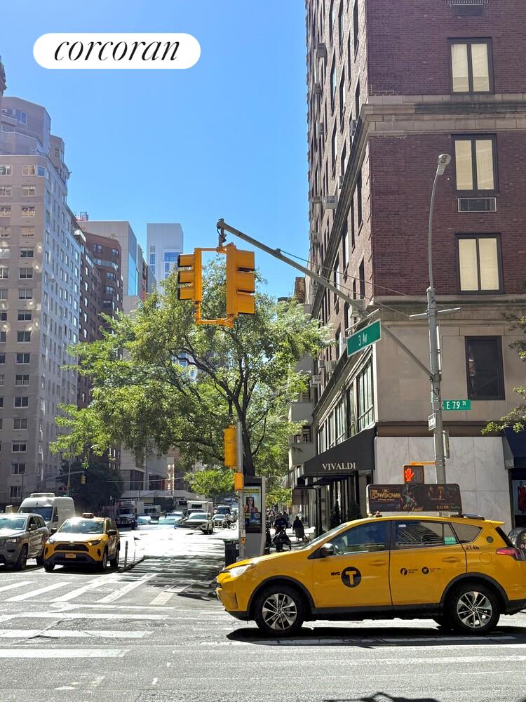 225 East 79th Street, Unit 2D Manhattan, NY 10075 - Photo 10 of 11 a car parked in front of a building