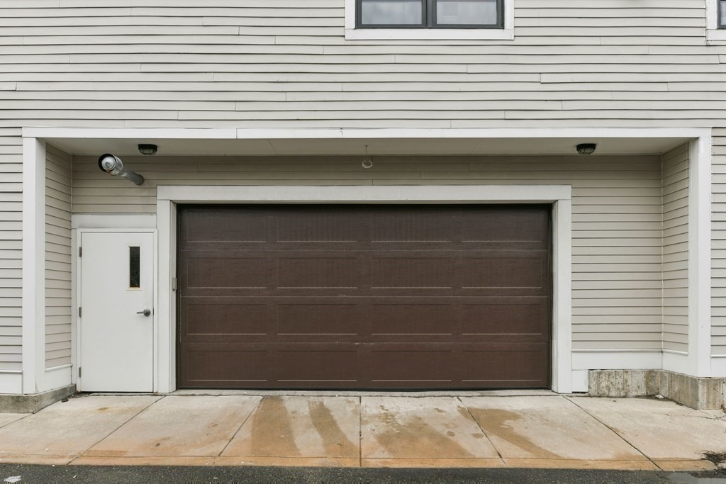 350 West 2nd Street, Unit 9 Boston, MA 02127 - Photo 30 of 42 a side view of a house with a door