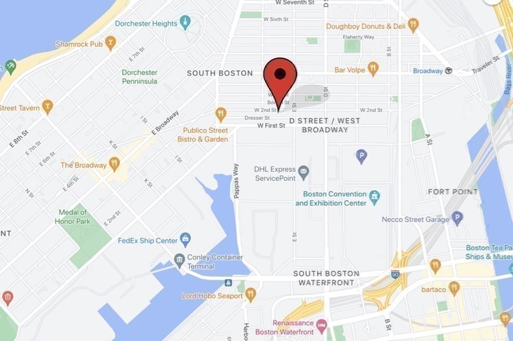 350 West 2nd Street, Unit 9 Boston, MA 02127 - Photo 38 of 42 a view of a kitchen with a refrigerator and a wooden floor