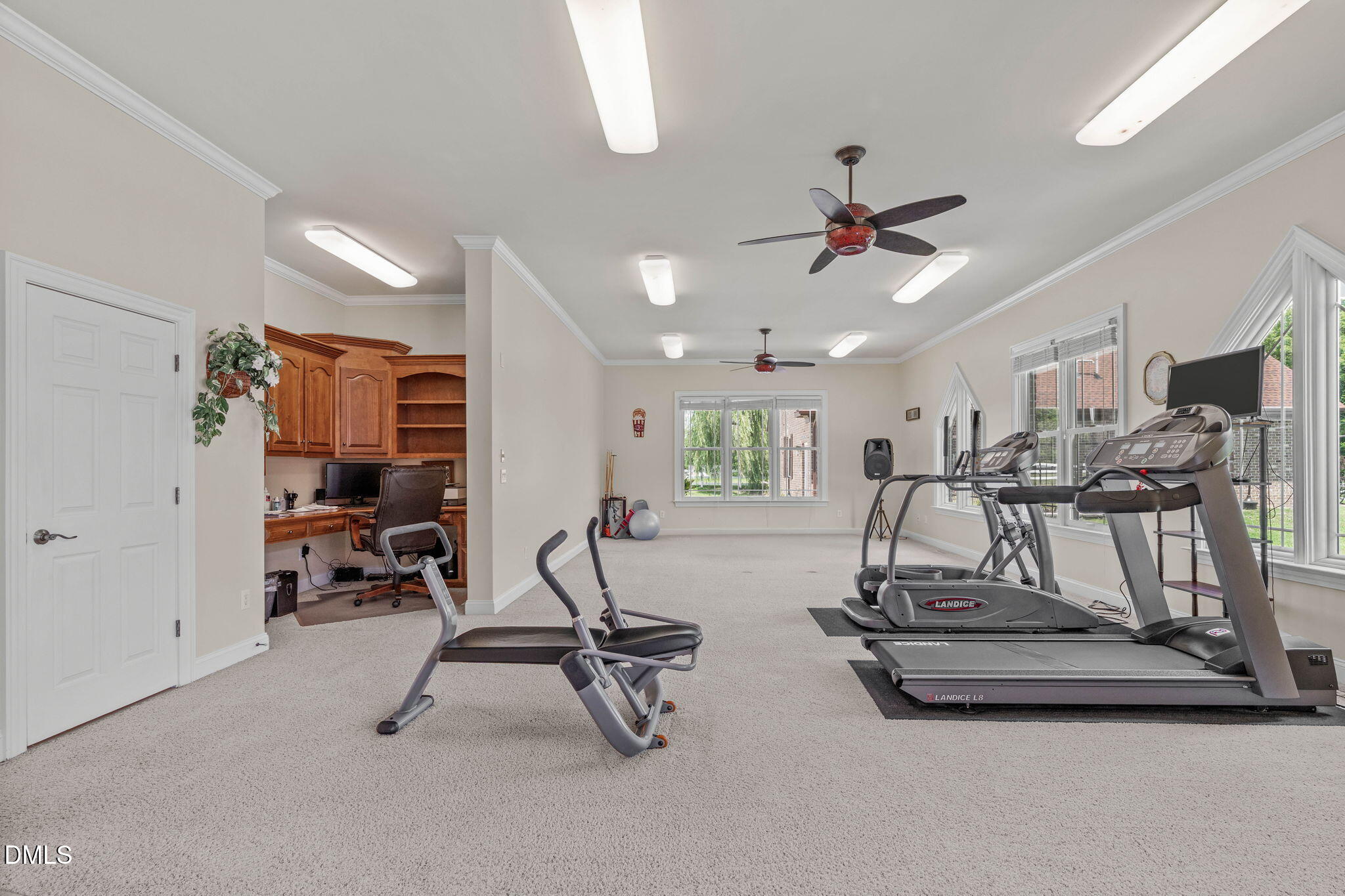10917 Jordan Road Raleigh, NC 27603 - Photo 24 of 58 a view of a room with gym equipment
