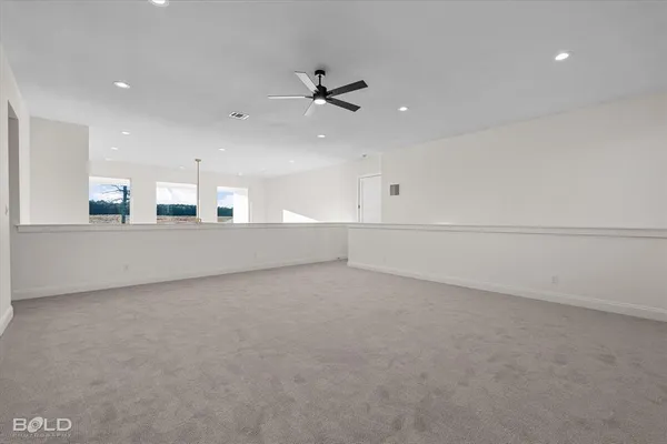 a view of a kitchen with a sink and an oven