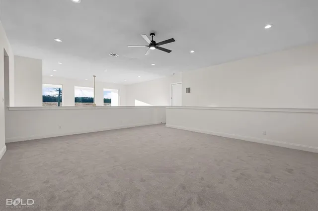 a view of a kitchen with a sink and an oven