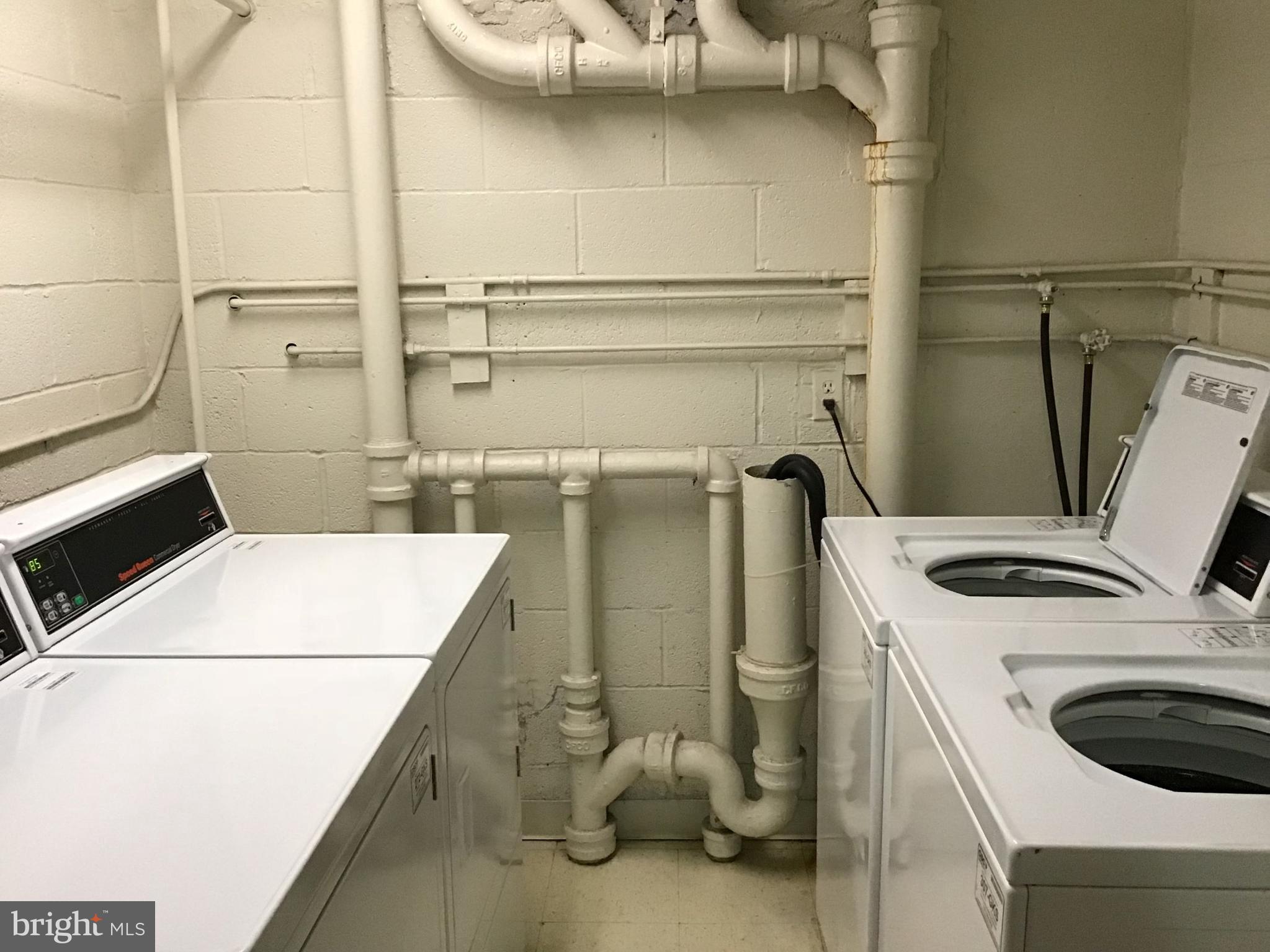 1440 N Street Northwest, Unit 812 Washington, DC 20005 - Photo 12 of 23 a utility room with dryer and washer