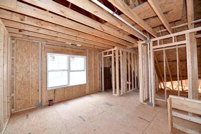 a view of a backyard with sitting area