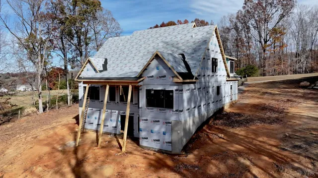 a front view of a house with garage