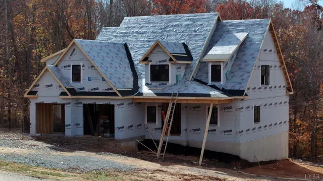 a view of an empty room with a fireplace