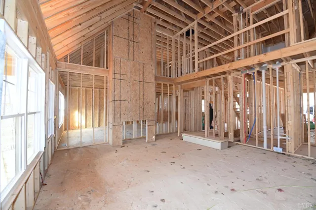 a view of an empty room with a fireplace