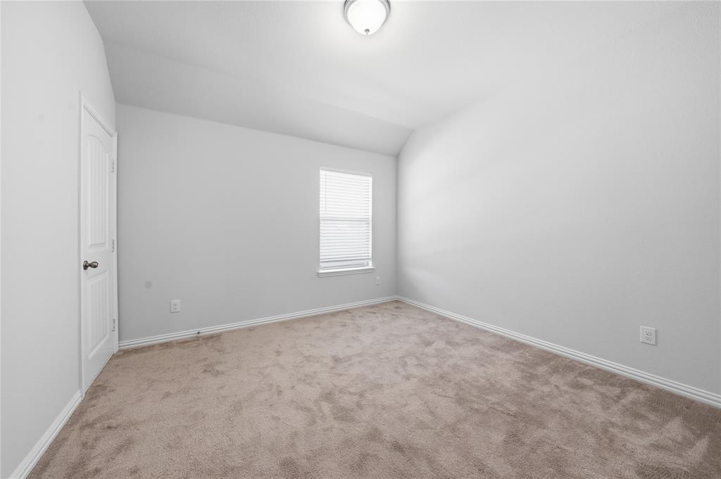 4542 Kipling Avenue Aubrey, TX 76227 - Photo 26 of 34 a view of an empty room with a window