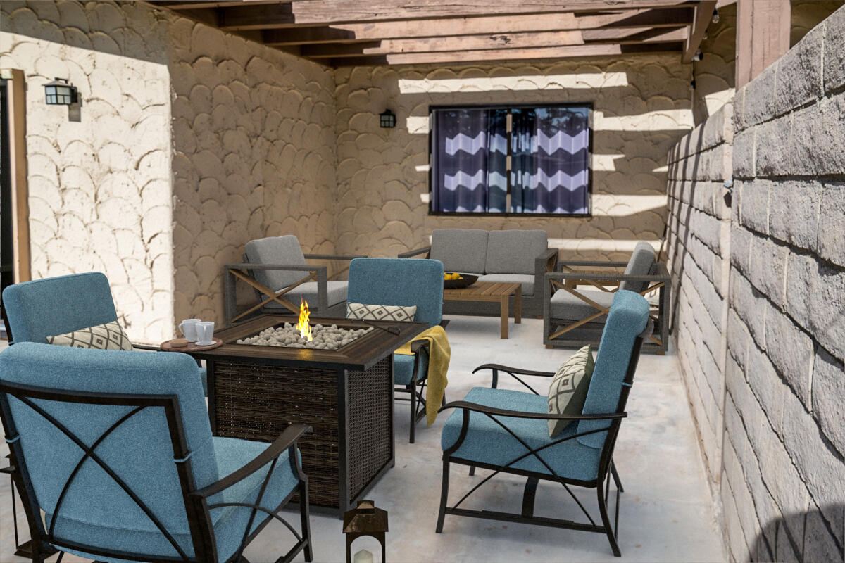 48941 Eisenhower Drive Indio, CA 92201 - Photo 15 of 17 a view of a dining room with furniture and window