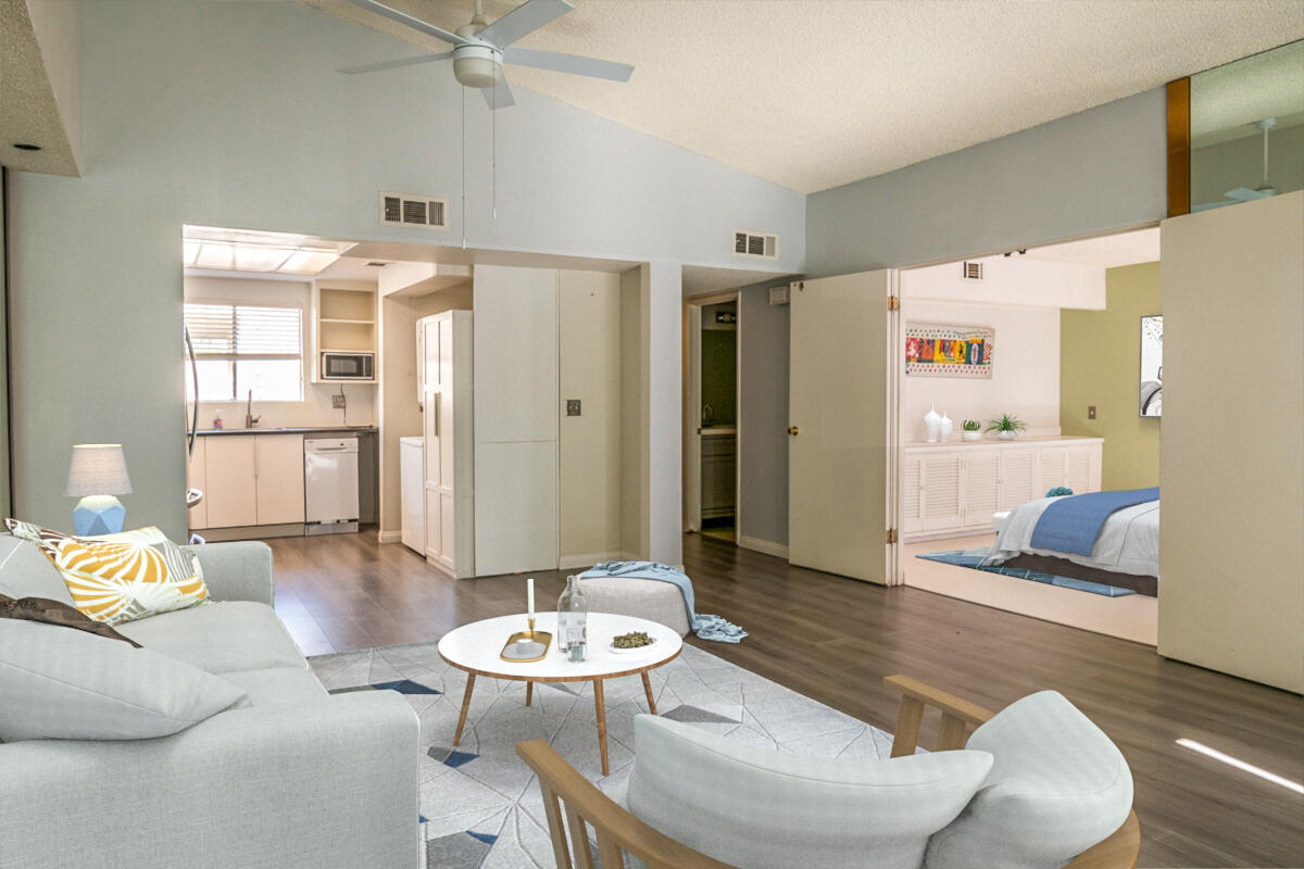 48941 Eisenhower Drive Indio, CA 92201 - Photo 3 of 17 a living room with furniture and wooden floor