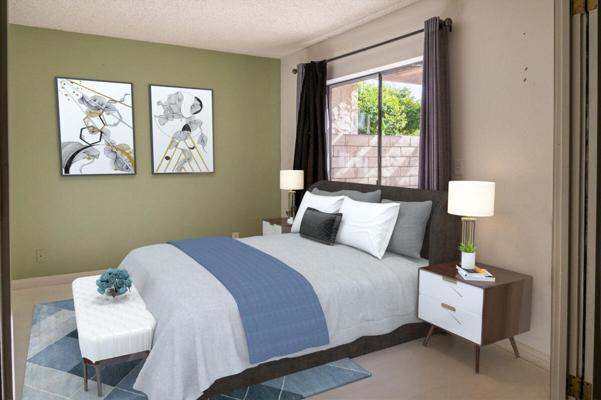 48941 Eisenhower Drive Indio, CA 92201 - Photo 8 of 17 a bed room with a bed and a window