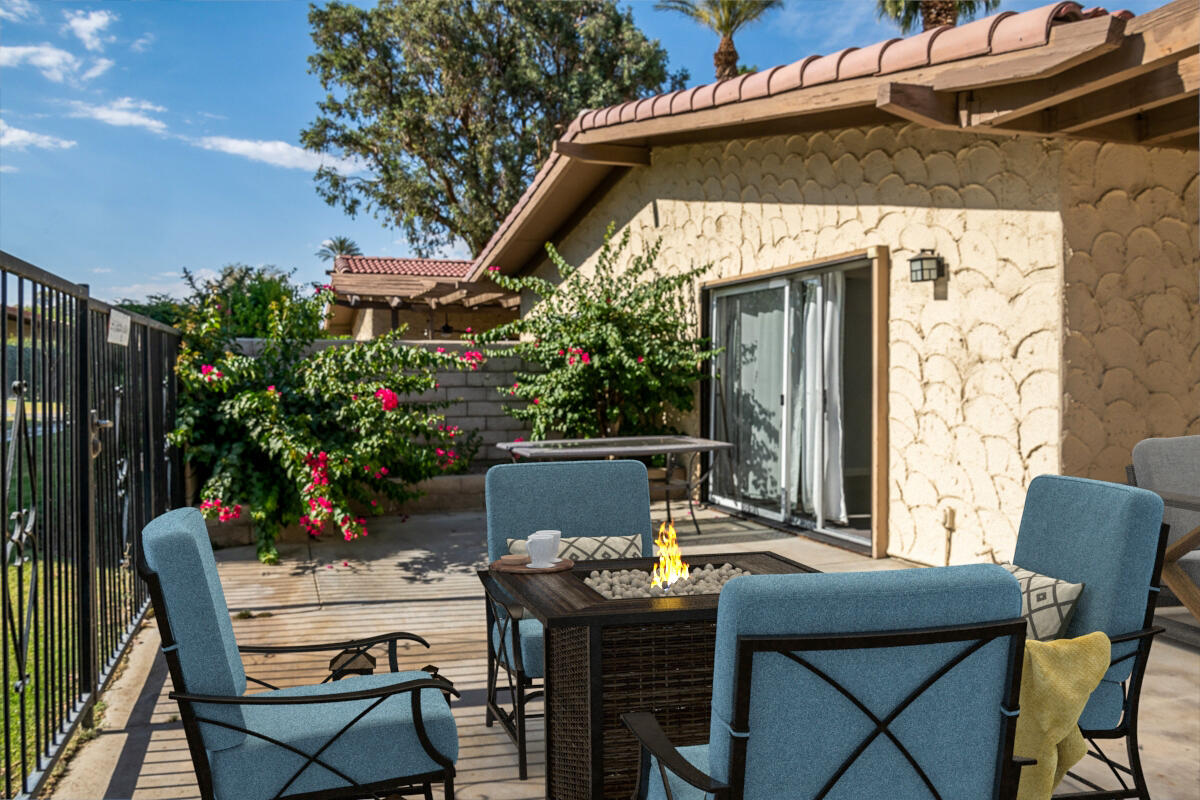 48941 Eisenhower Drive Indio, CA 92201 - Photo 9 of 17 a view of outdoor dining space with a table and chairs
