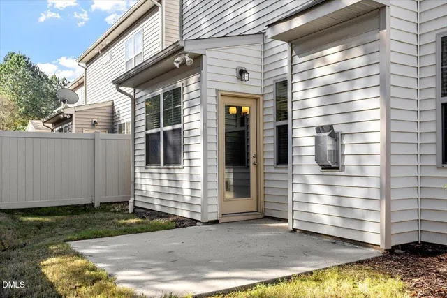 a view of a backyard with trees