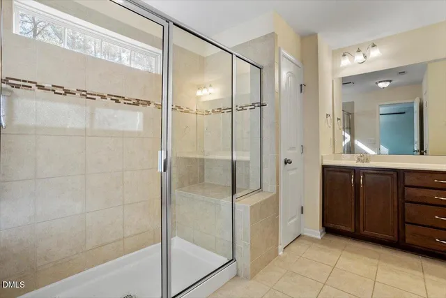 a kitchen with stainless steel appliances granite countertop a refrigerator and a microwave