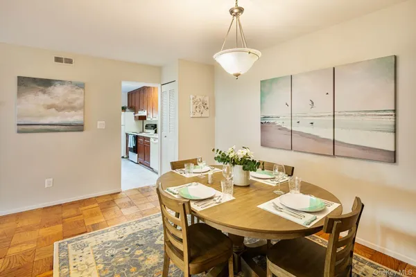a view of a dining room with furniture