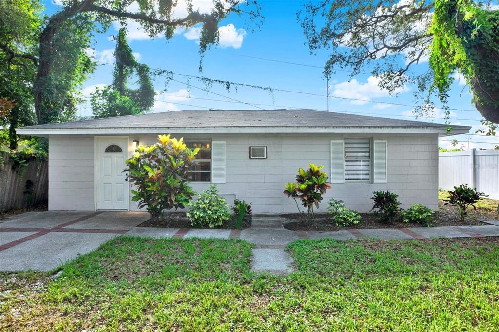 1359 South Michigan Avenue Clearwater, FL 33756 - Photo 1 of 1 a front view of a house with a yard