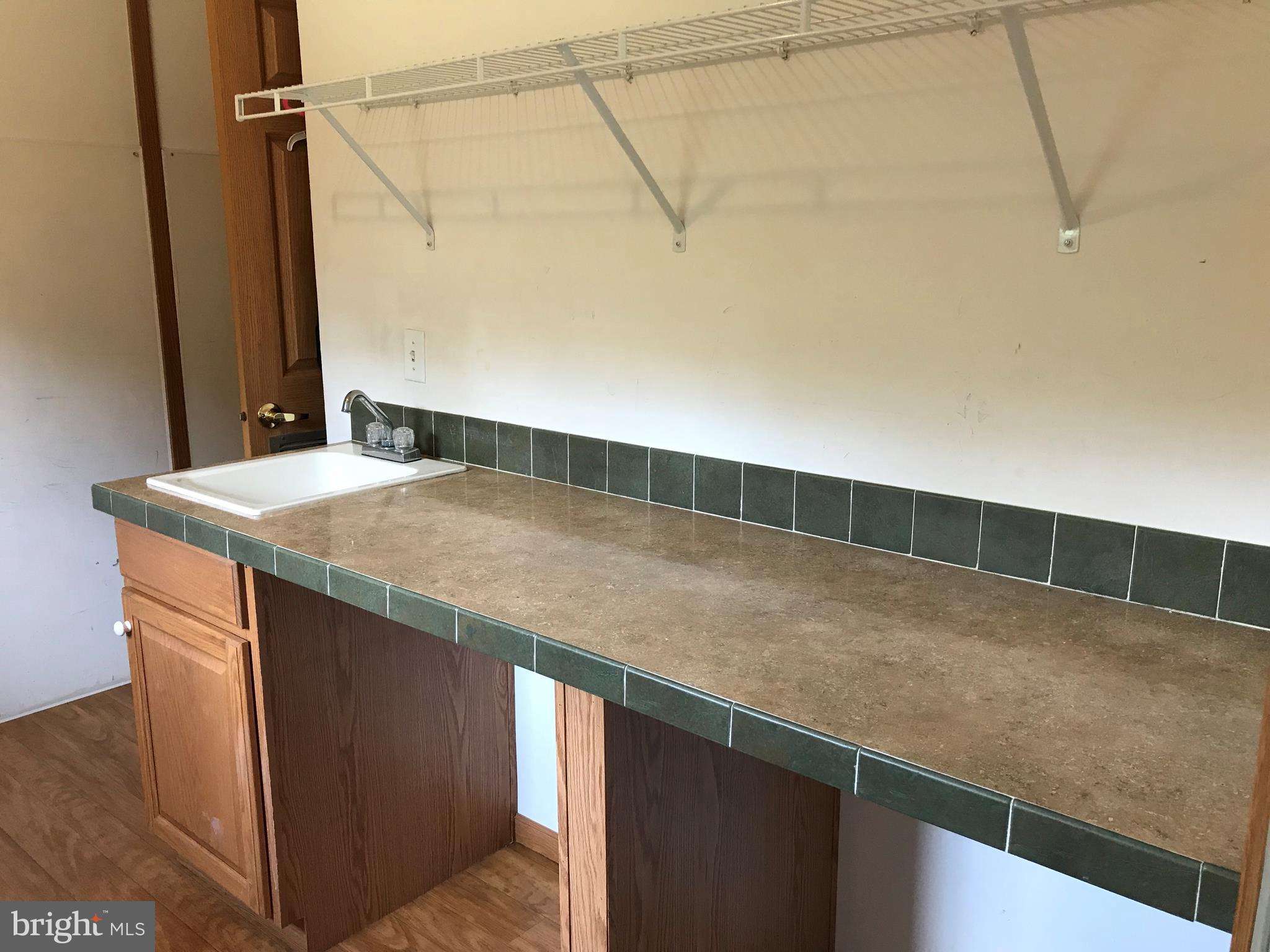 13727 Orchard Ridge Road Hancock, MD 21750 - Photo 12 of 41 Folding area with sink