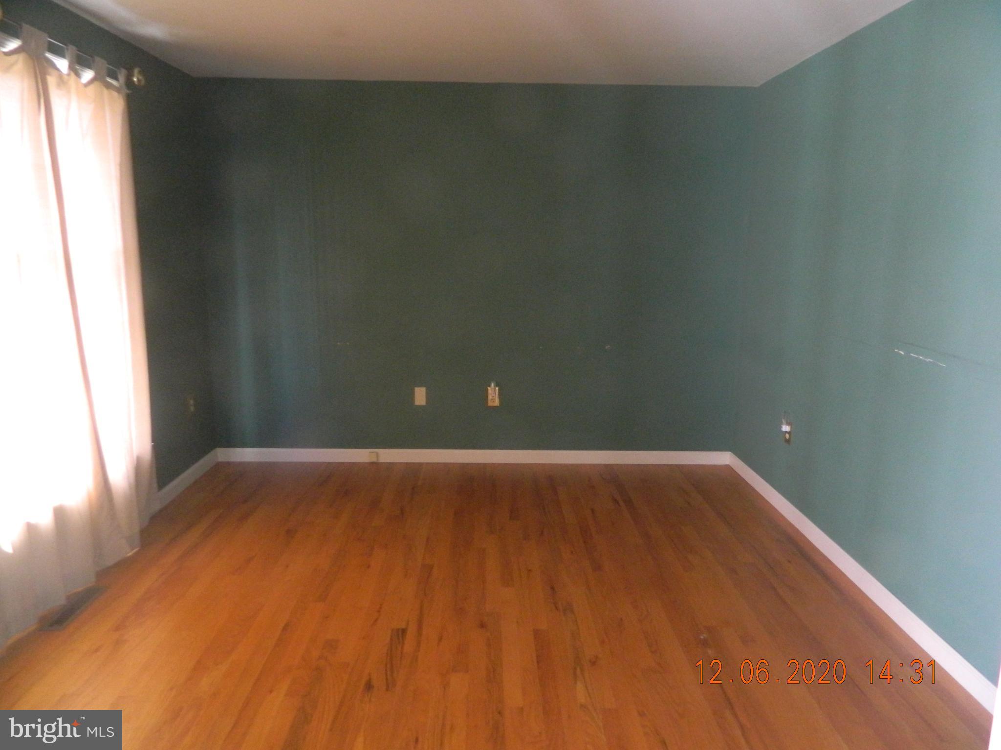 161 Spring Dale Drive Charles Town, WV 25414 - Photo 5 of 39 Den or office with wood flooring.
