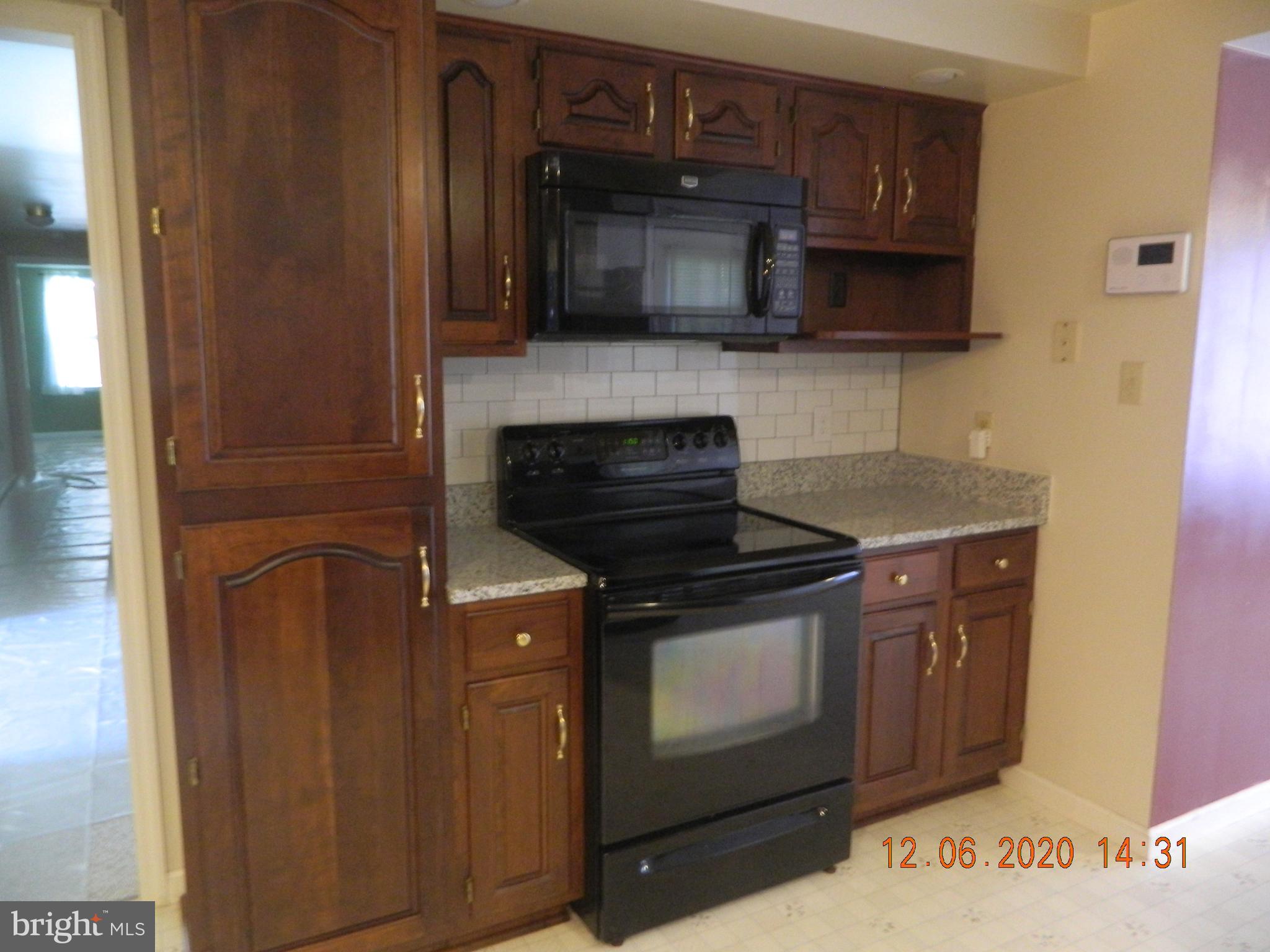 161 Spring Dale Drive Charles Town, WV 25414 - Photo 6 of 39 Electric range and Microwave