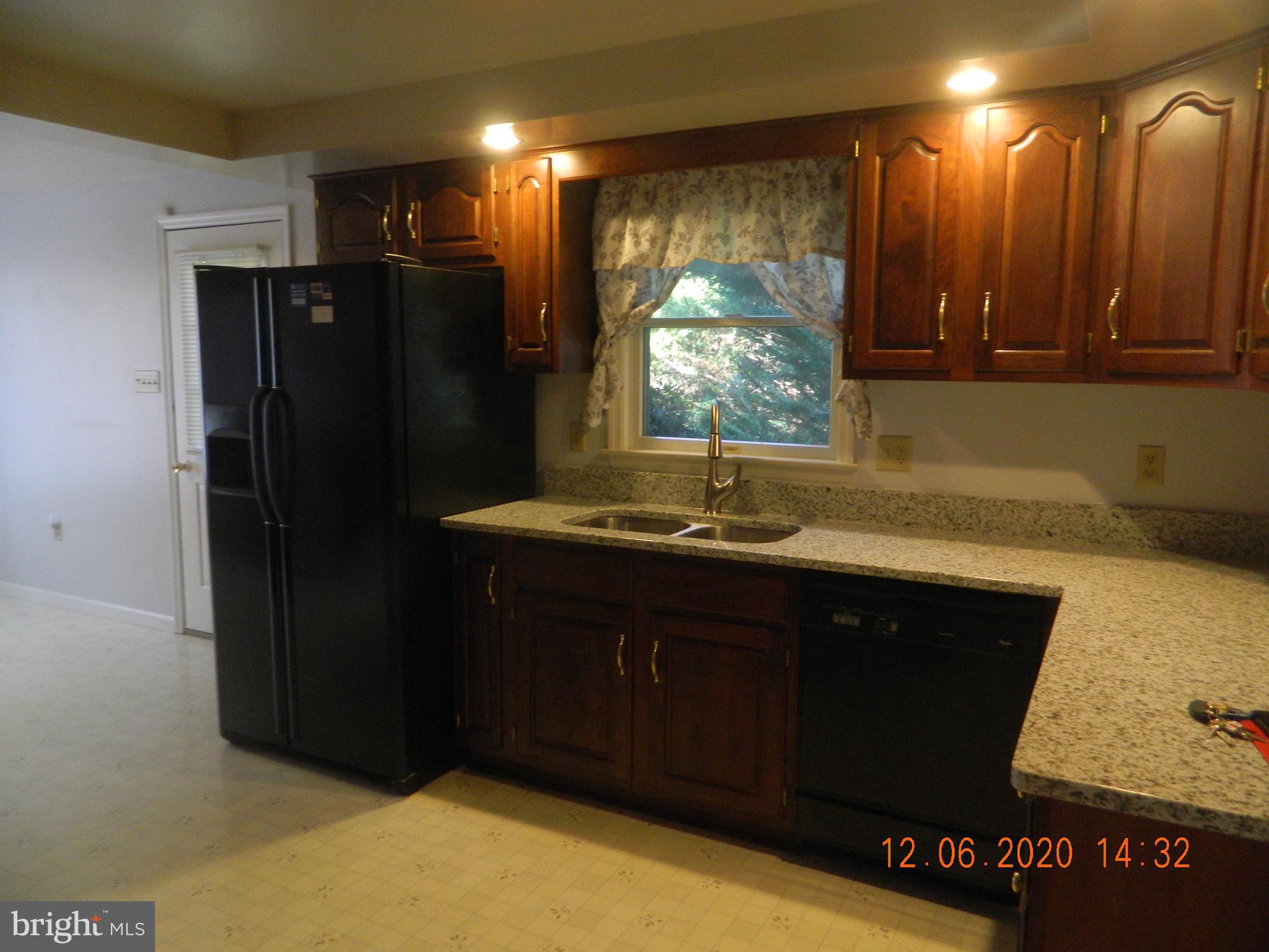 161 Spring Dale Drive Charles Town, WV 25414 - Photo 9 of 39 Great work space with extended counter tops.