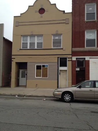 a car parked in front of a house