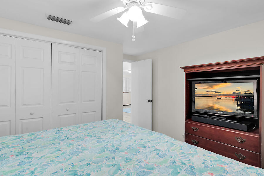 303 Sombrero Beach Road Marathon, FL 33050 - Photo 40 of 84 Side A-primary bedroom w/TV & console