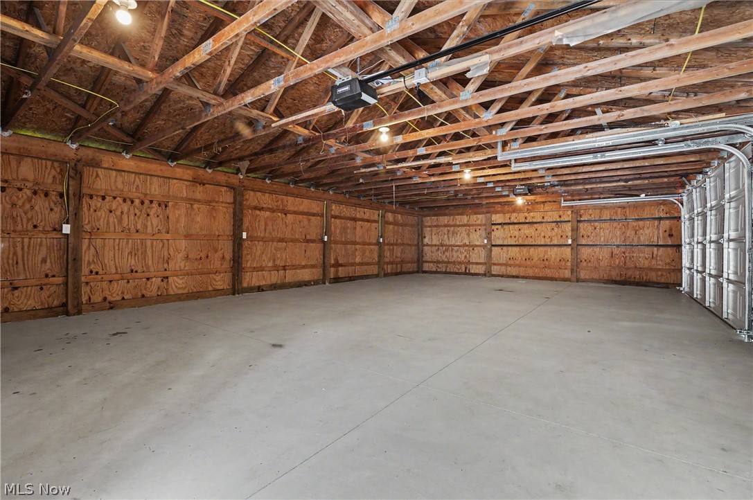 7583 Yale Road Atwater, OH 44201 - Photo 9 of 41 Amazing 4 car garage provides so many possibilities and additional storage space.