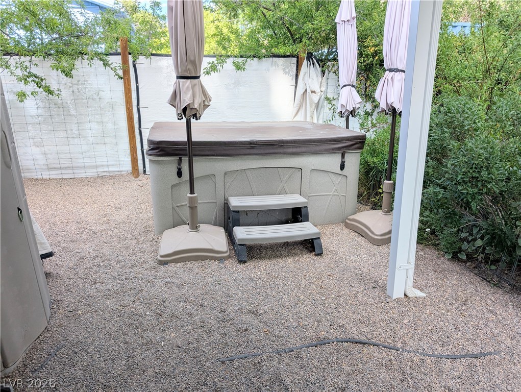 102 Rowan Drive Caliente, NV 89008 - Photo 21 of 28 An inviting outdoor spa with easy access, perfect for unwinding after a long day.