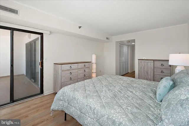 a view of a room that has a large window