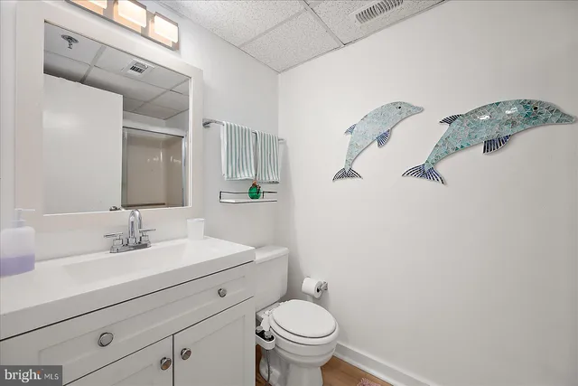 a bathroom with a shower and a bath tub