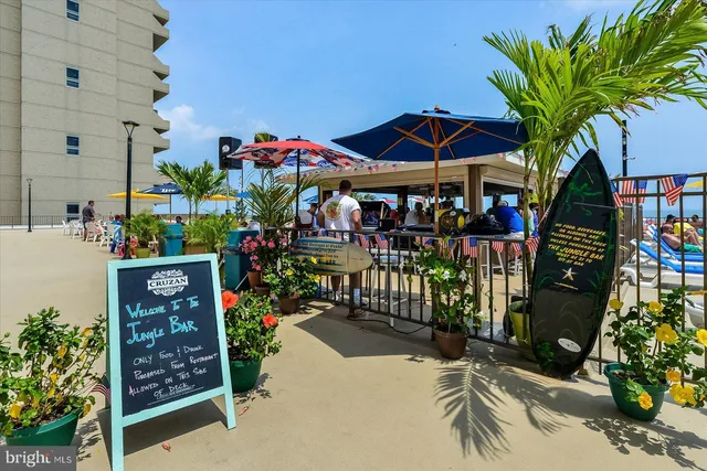 a group of people sitting at tables in a room