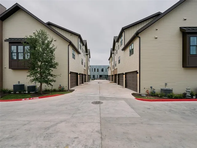 an aerial view of an buildings and street